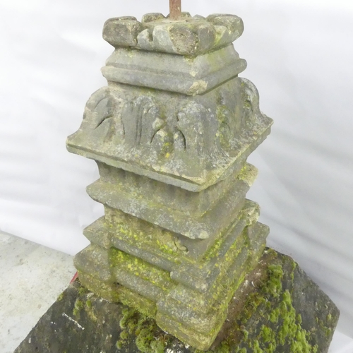 120 - A Victorian copper weathervane mounted on weathered natural stone base and plinth. 60x166x60cm.