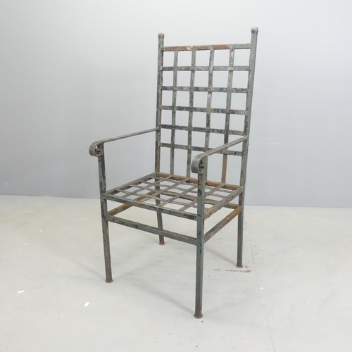 109 - An antique weathered wrought iron garden chair. Overall 50x110x50cm, seat 43x43x40cm.