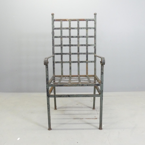 109 - An antique weathered wrought iron garden chair. Overall 50x110x50cm, seat 43x43x40cm.