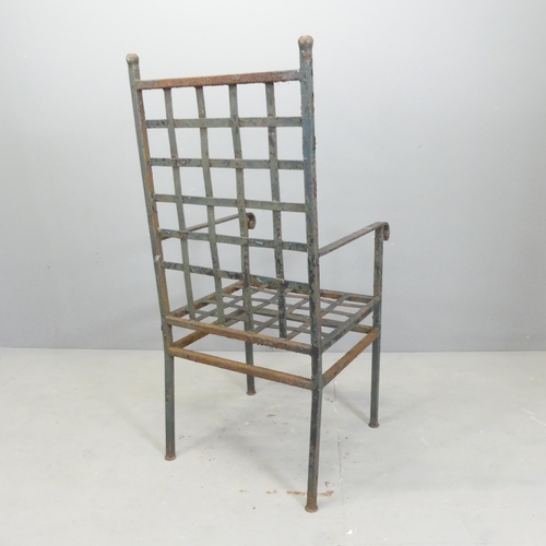 109 - An antique weathered wrought iron garden chair. Overall 50x110x50cm, seat 43x43x40cm.