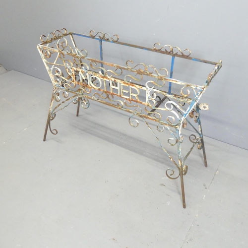 121 - A vintage painted wrought iron plant stand. 97x66x34cm.