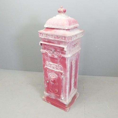 131 - A cast aluminium postbox. 36x100x32cm.