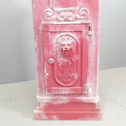 131 - A cast aluminium postbox. 36x100x32cm.