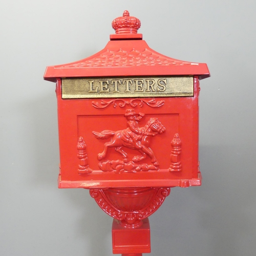 132 - A painted Victorian style letterbox. 43x118x30cm.