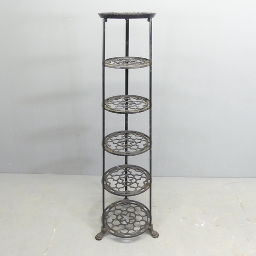 138 - A vintage cast iron six-tier pot rack, with label for The Viking. height 123cm