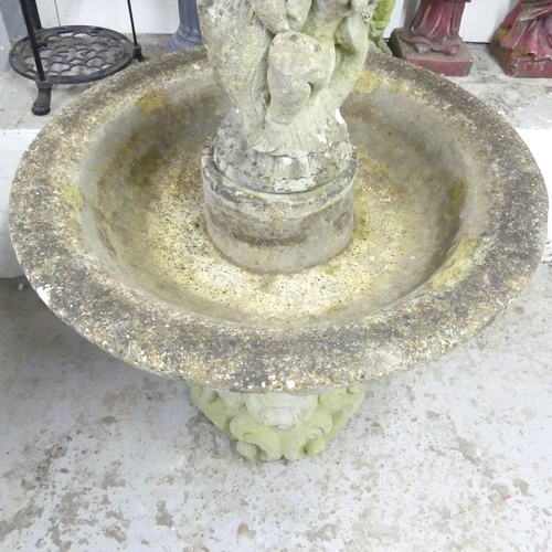 141 - A weathered concrete three section garden fountain. 84x122cm