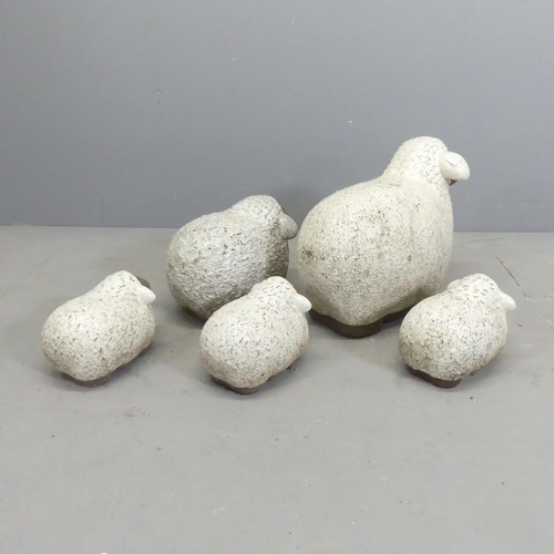 143 - A flock of five glazed ceramic sheep ornaments. Largest 46x36x25cm.