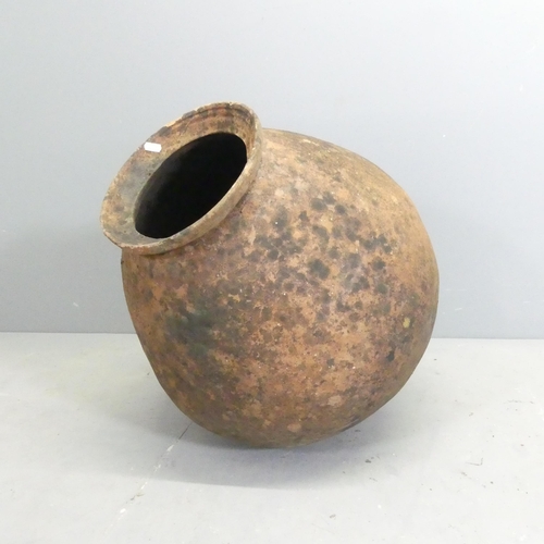 144 - An antique hand made terracotta water jar. 50x58cm.