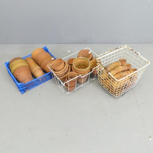 149 - A quantity of approximately 140 terracotta pots. Largest 15cm, smallest 5cm.