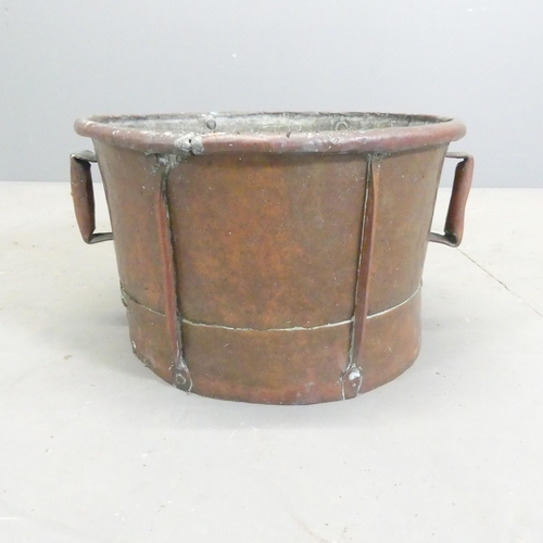 150 - A French Arts & Crafts copper vessel. 41x23cm.