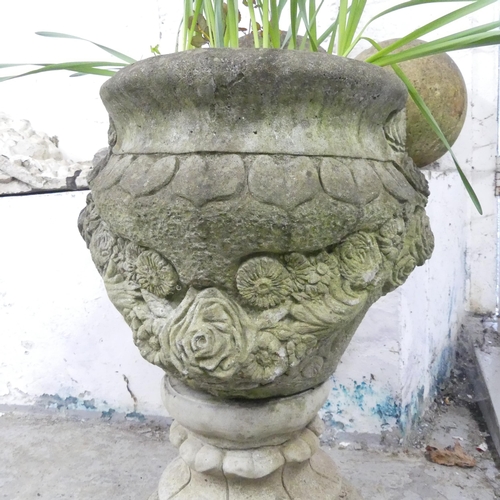 154 - A weathered concrete two-section garden urn. 48x63cm.