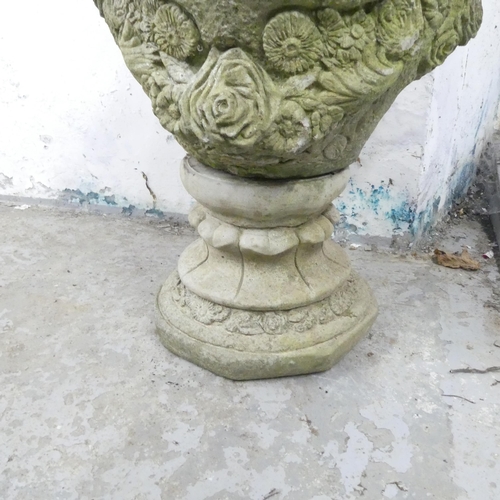 154 - A weathered concrete two-section garden urn. 48x63cm.