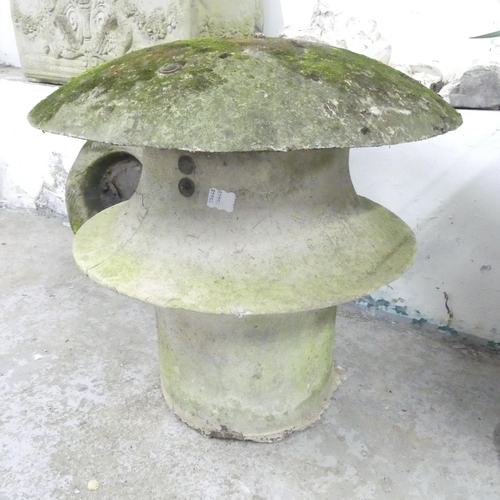 157 - A weathered composite chimney pot. 64x64cm.