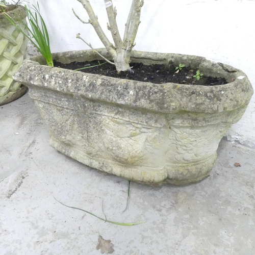 159 - An antique weathered stone planter of shaped form. 82x38x43cm.