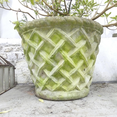 163 - A large weathered concrete garden planter, with lattice decoration. 60x45cm.