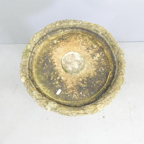 164 - A tree and hare design weathered concrete bird bath. 49x71cm.