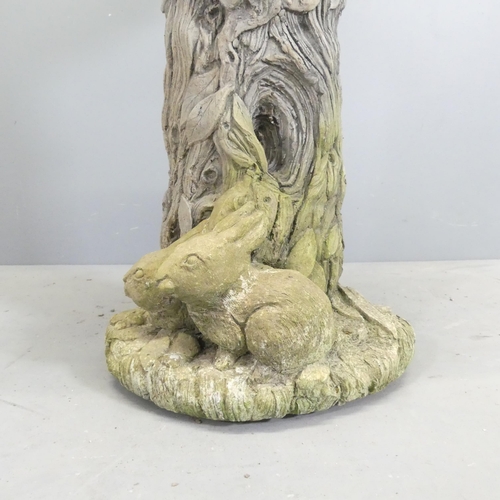 164 - A tree and hare design weathered concrete bird bath. 49x71cm.