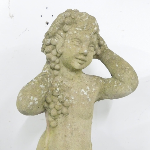 166 - A weathered concrete garden statue, study of a Putti / cherub. Height 90cm.