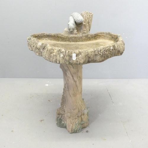 167 - HENRI STUDIO - a two section cast stone birdbath with squirrel decoration. Height 70cm. RRP £219.99... 