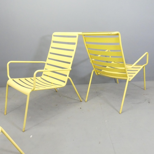 169 - A pair of modern painted metal garden loungers, with matching table / footstool.