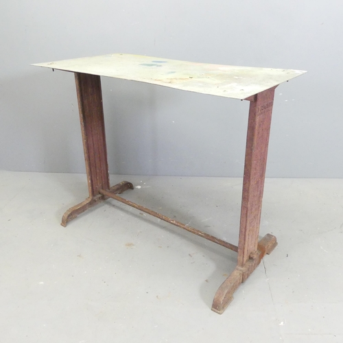 63 - FISCHEL - An early 20th century French industrial work table with cast iron base and maker's marks. ... 