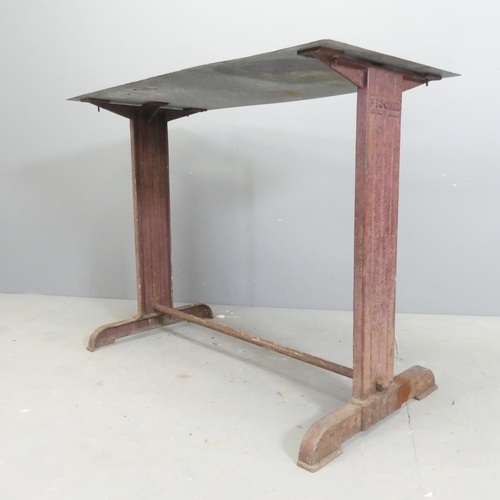 63 - FISCHEL - An early 20th century French industrial work table with cast iron base and maker's marks. ... 