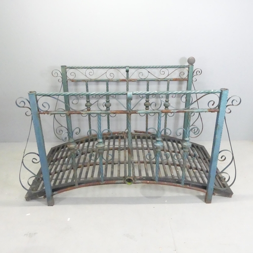 178 - A weathered painted metal arch bridge. 166x100x95cm.