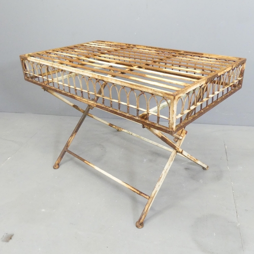 179 - A vintage painted metal folding garden table, with slatted top and wirework arch detail to sides. 87... 