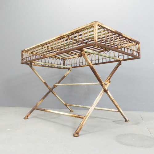 179 - A vintage painted metal folding garden table, with slatted top and wirework arch detail to sides. 87... 