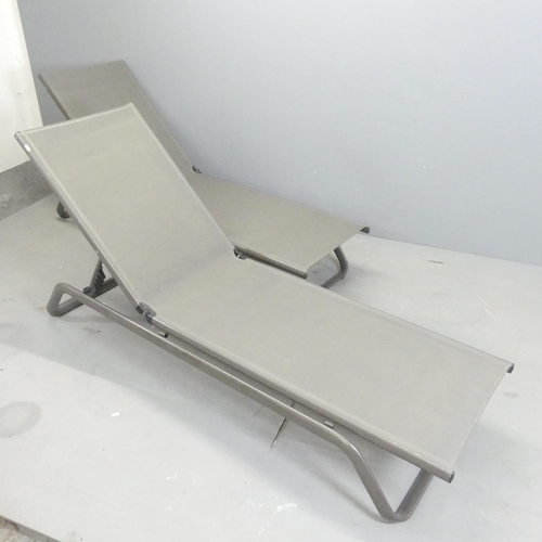 111 - ATELIER ALINEA - a pair of Contemporary Swiss garden reclining sun loungers. With maker's label.... 