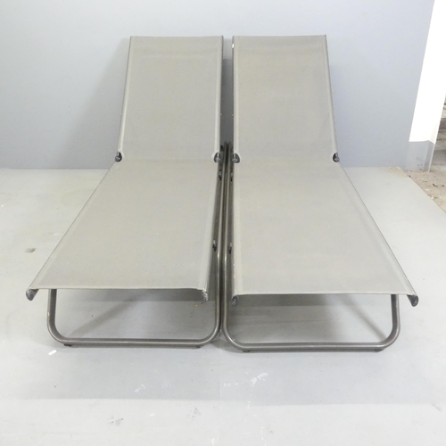 111 - ATELIER ALINEA - a pair of Contemporary Swiss garden reclining sun loungers. With maker's label.... 