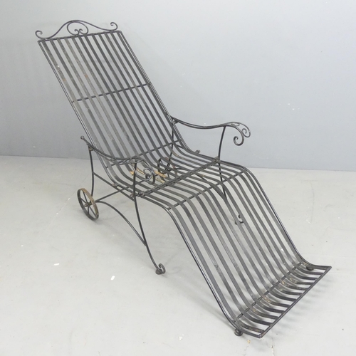 186 - A painted iron folding sun lounger. Overall 160x105x72cm.