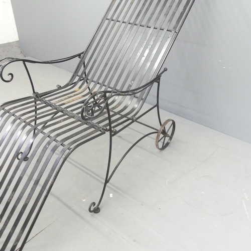 186 - A painted iron folding sun lounger. Overall 160x105x72cm.