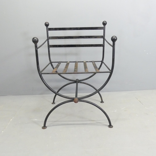 196 - A vintage neoclassical style painted iron curule chair in the manner of Maison Jansen.