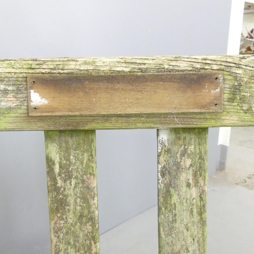 200 - LISTER - A weathered teak slatted garden bench, with maker's badge to side. 185x95x72cm.... 