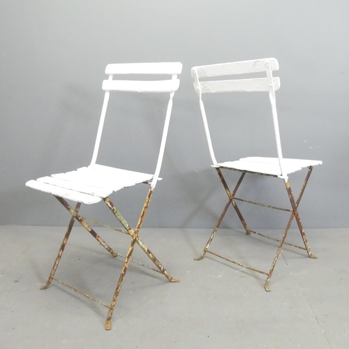 207 - A set of four Parisienne folding bistro café chairs.