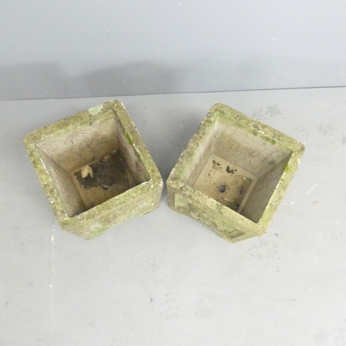 58 - A pair of weathered concrete square garden planters with Tudor rose design. 34x36cm.