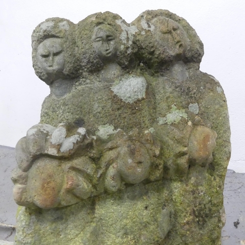 40 - A carved stone sculpture of a six figure family group. 33x59x30cm.