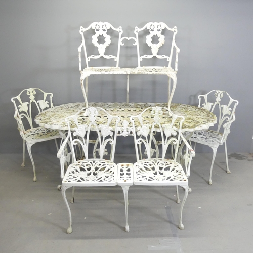 261 - A painted aluminium oval garden table, 180x70x89cm, with two matching two-seater benches and arm cha... 