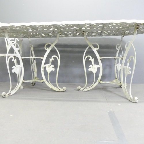 261 - A painted aluminium oval garden table, 180x70x89cm, with two matching two-seater benches and arm cha... 