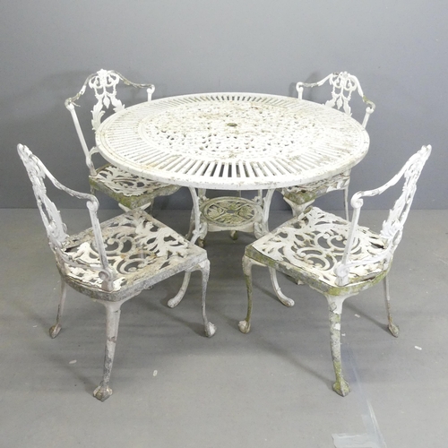 262 - A circular painted aluminium two-tier garden table, 107x71cm, with four matching chairs.