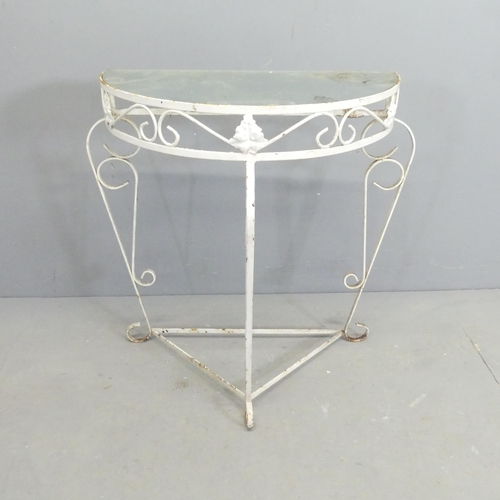 267 - A painted wrought metal demi-lune console table with inset glass top. 72x69x38cm.