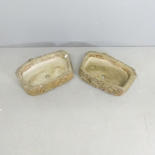 271 - A pair of weathered concrete log design planters. 47x17x33cm.