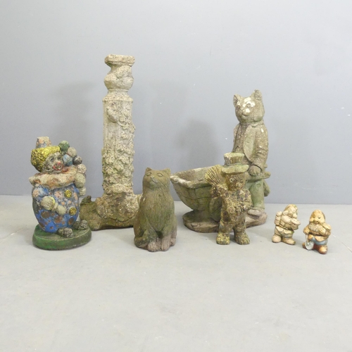 280 - A selection of garden ornaments including a concrete cat with wheelbarrow, 57cm, clown, dwarves etc.... 