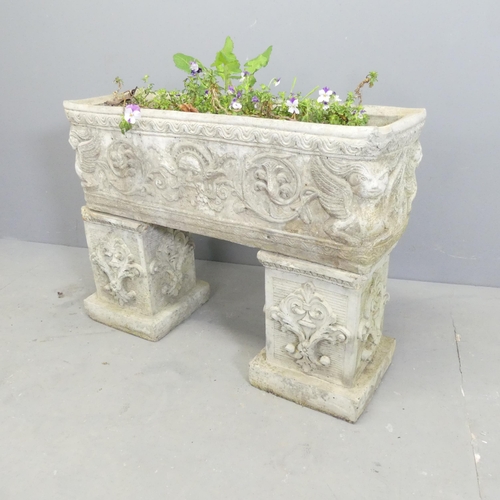 281 - A three-section stone trough on twin pedestal base. 70x53x24cm.