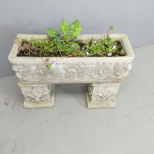 281 - A three-section stone trough on twin pedestal base. 70x53x24cm.