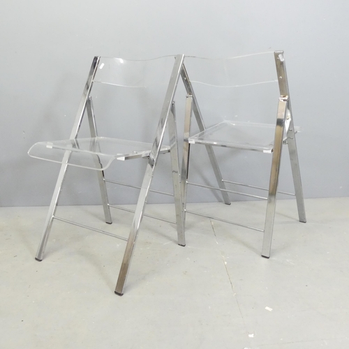 115 - Three contemporary folding chairs, with lucite seats on chrome frames.