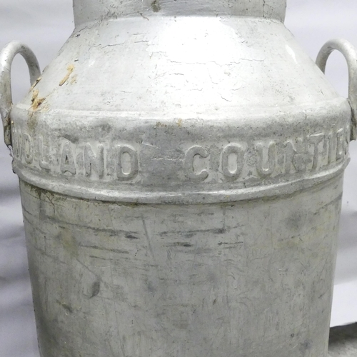 287 - A near pair of galvanised milk churns. Tallest marked Midland Counties, 69cm.