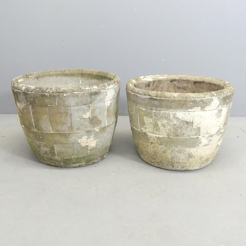 288 - A pair of circular concrete planters. 41x31cm.