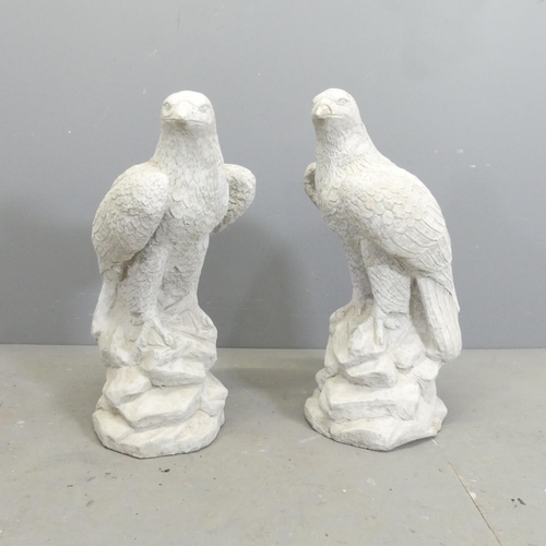 117 - A pair of modern composite garden statues, studies of Eagles. Height 60cm.